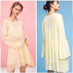 LACAUSA Seashell Mini bell sleeve sheer dress in pale yellow. Size XS